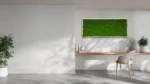 Zöld izlandi mohakép fehér falon, alatta fa konzolasztal székkel egy minimalista szobában.